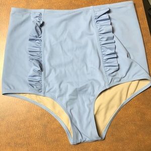 Kortni Jeane ruffle down in front powder blue